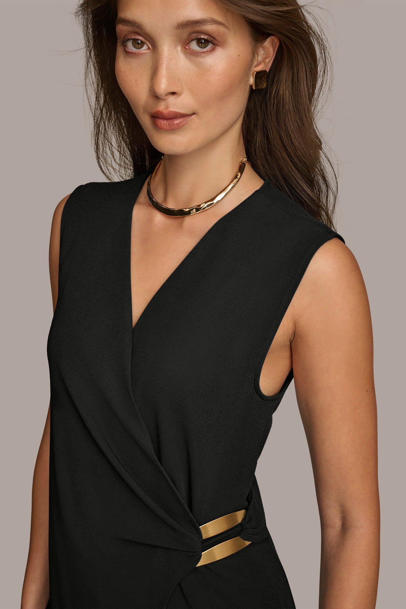 FAUX WRAP TOP WITH BRUSHED HARDWARE DETAIL